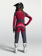 Alpinestars Stella Techstar Swan Jersey, women's crimson and dark gray motocross gear with ventilation, rear on-model view.