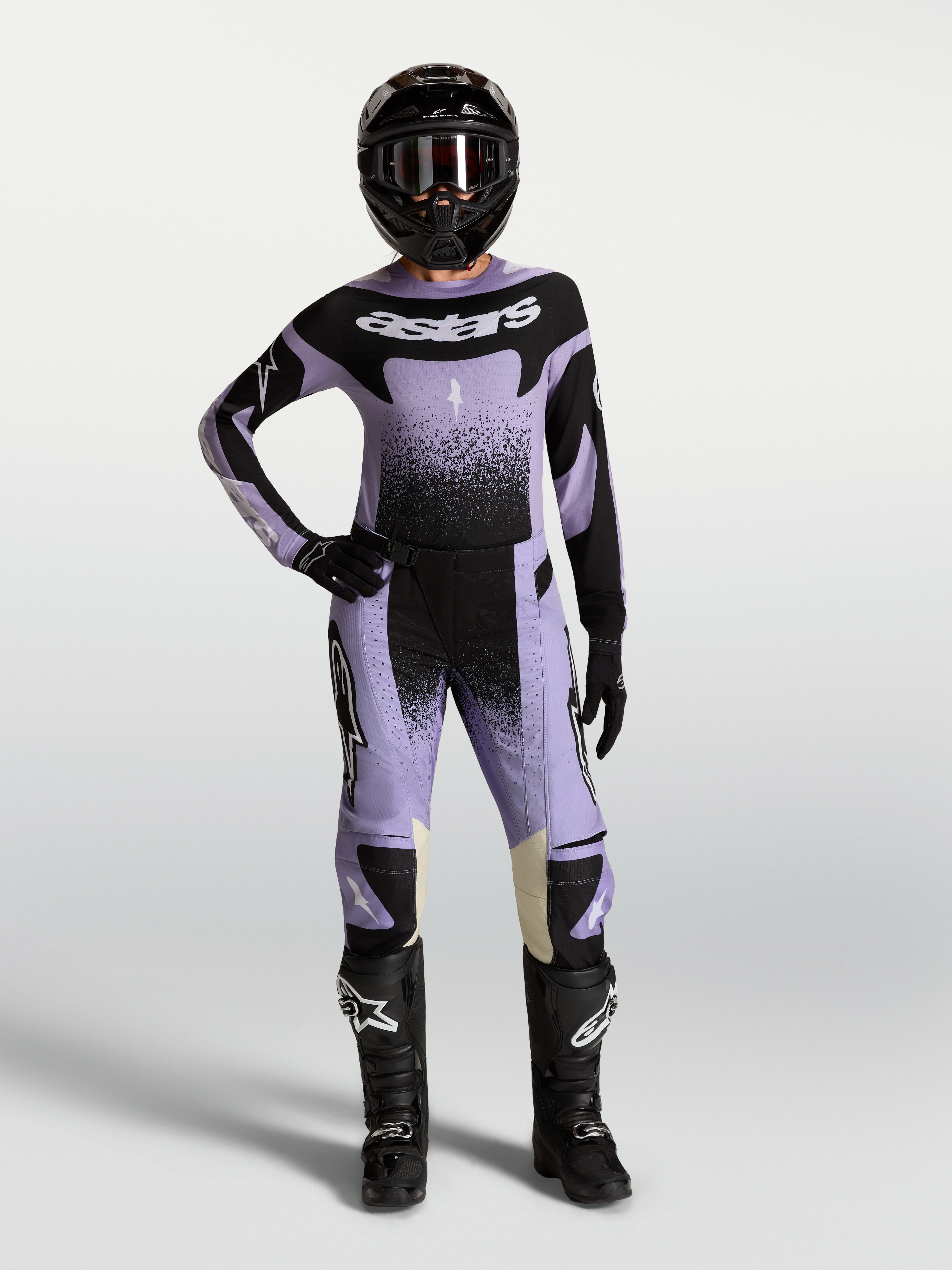 Alpinestars Stella Techstar Swan Gear Set, women's motocross racing outfit in light violet and black, includes jersey and pants.