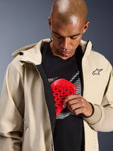 Alpinestars Radium Tech Hoodie in Mastic Aluminum, Urban Motorcycle Jacket, model demonstrating internal armor pocket with a red Nucleon chest protector, windproof tech shell with a casual hoodie design and Alpinestars branding.