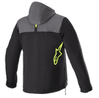 Alpinestars Sherpa Hoodie, back view, Tar Gray and Black with Yellow Fluo accents, neon yellow star logo on the side, softshell motorcycle jacket with hood, side zipper detail, urban commuting apparel