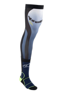 Alpinestars Knee Brace Socks, Long Motocross Riding Socks, Night Navy and Yellow Fluo, featuring stretch Lycra upper with mesh inserts, silicone grip hem, and padded ankle support for off-road protection