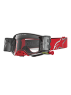 Alpinestars Supertech Firma Roll Off Goggles in red and silver for motocross, featuring clear lenses and roll-off canisters.