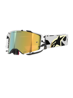 Alpinestars Supertech Corp Goggles Absolute Vision, Motocross Goggles, white and black patterned frame with gold mirror lens, wide strap with black abstract design and gold Alpinestars logo, "ONE GOAL. ONE VISION." branding on lens, high-performance racing gear.
