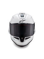Alpinestars Supertech R10 Solid Helmet, Full-Face Racing Helmet, Glossy White with black details, front view showing dark smoke visor, aerodynamic ventilation system, and black Astars logo