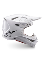 Alpinestars Supertech M10 Solid Helmet ECE 22.06, white glossy motocross helmet with black logo, peak visor and ventilated full-face design, side view
