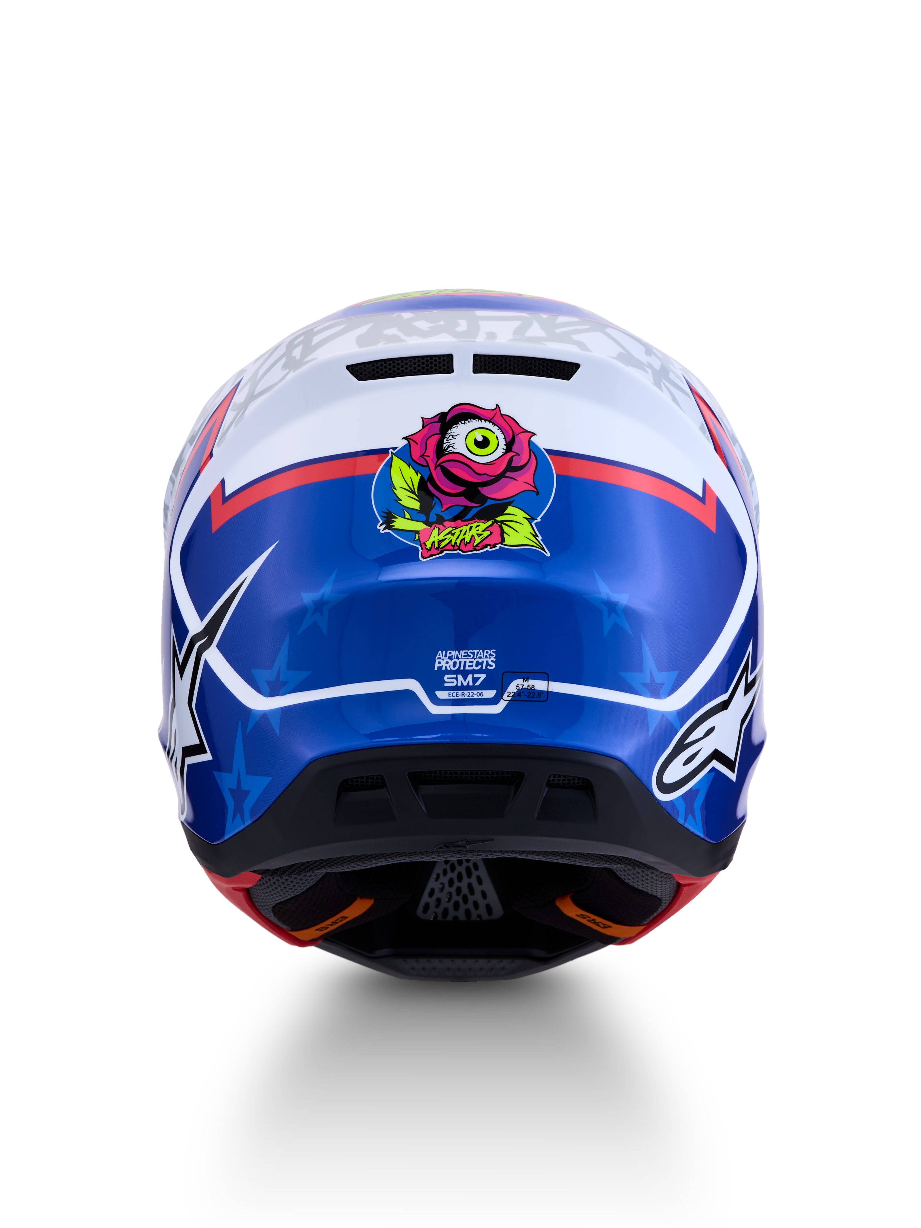Alpinestars S-M7 Blaster Helmet ECE06, blue and white motocross helmet, rear view with rose graphic and ECE certification.