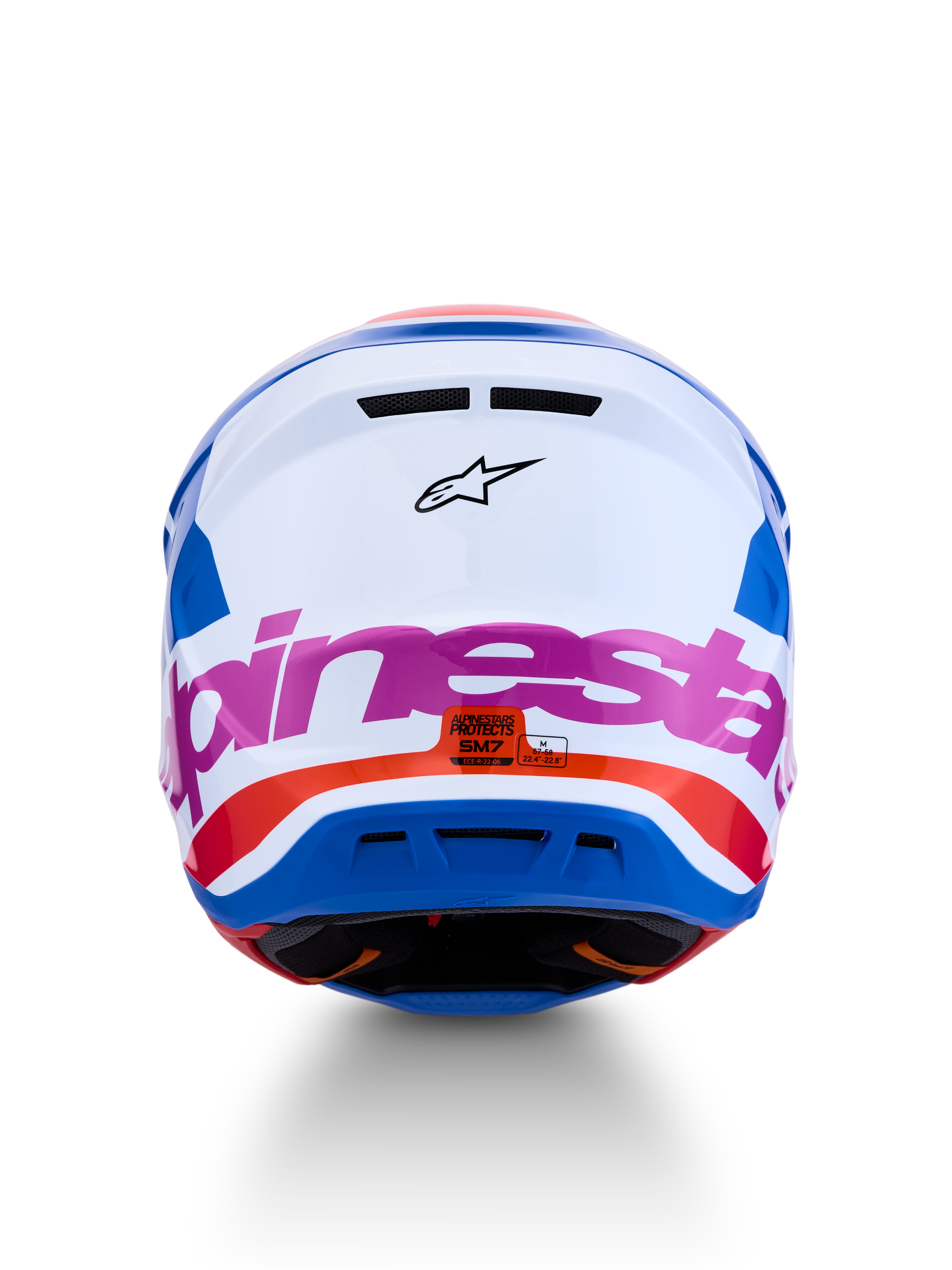 Alpinestars S-M7 Core Helmet ECE06, white and blue motocross helmet with pink and orange accents, ECE 22.06 certified.