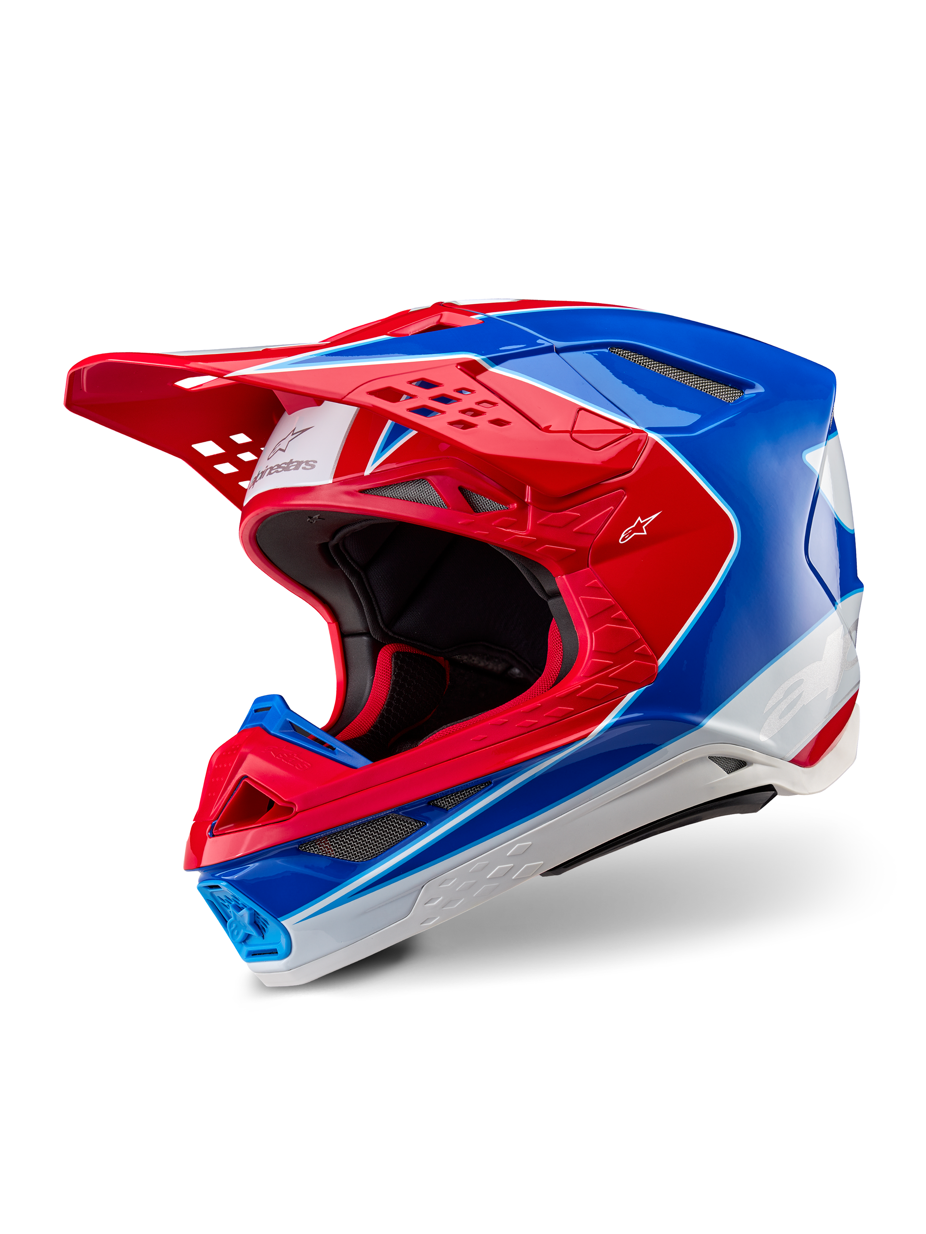 Alpinestars Supertech M10 Aeon Helmet, Motocross Helmet, Bright Red Blue Glossy, three-quarter view showing aerodynamic shell with multiple ventilation ports, white and red graphic accents, Alpinestars logo on visor and side, professional off-road racing gear