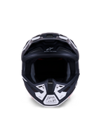 Alpinestars S-M7 Dasher Helmet ECE 22.06, Motocross Helmet, Matte Black and White, Front view showing ventilation ports and geometric graphics, features "ONE GOAL - ONE VISION" text, professional off-road racing protection
