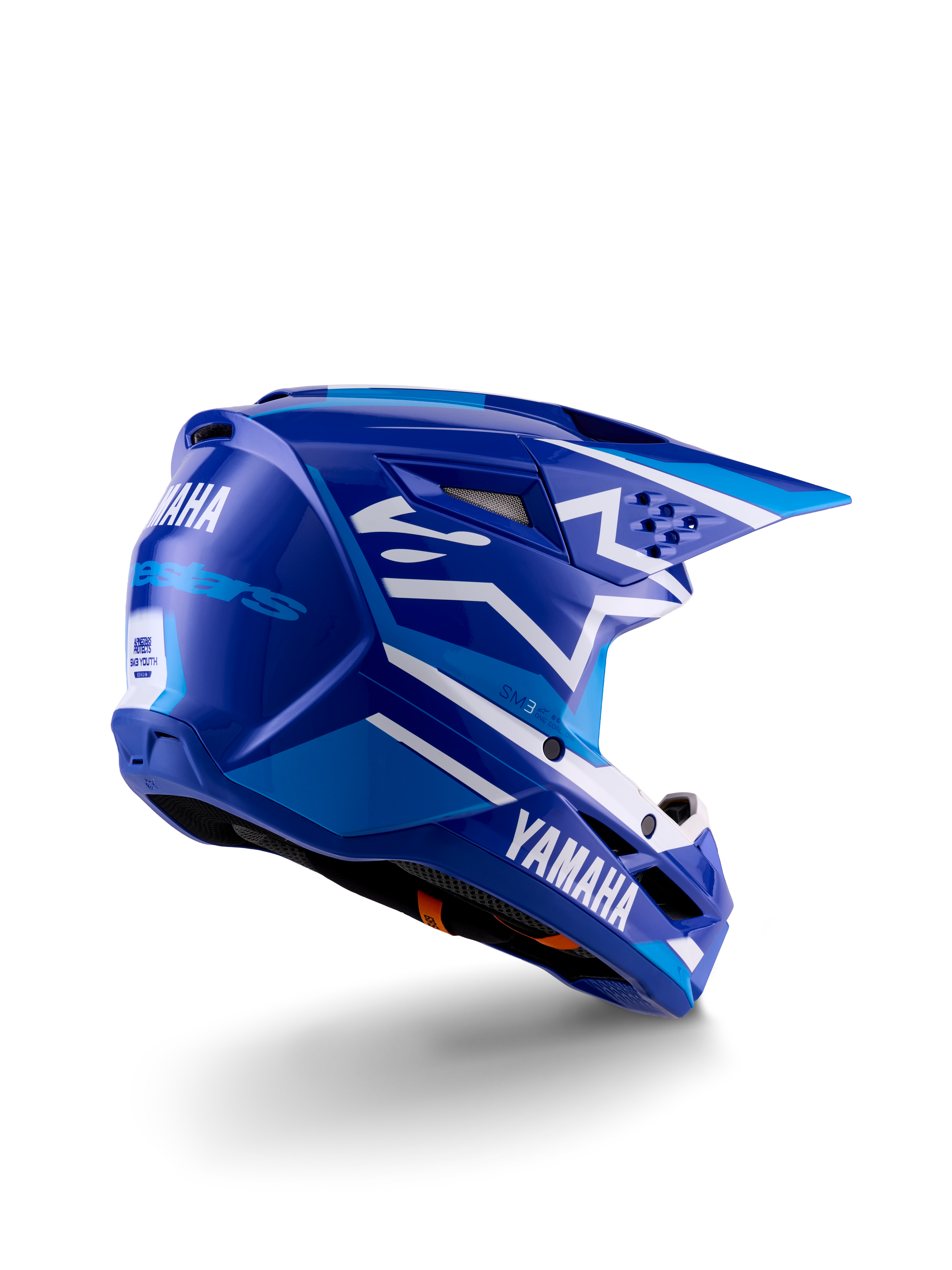 Alpinestars Yamaha S-M3 Youth Motocross Helmet, Blue and White Glossy, featuring bold Yamaha branding on the side and back, aerodynamic shell design with rear ventilation, youth-specific off-road head protection in a three-quarter rear view.