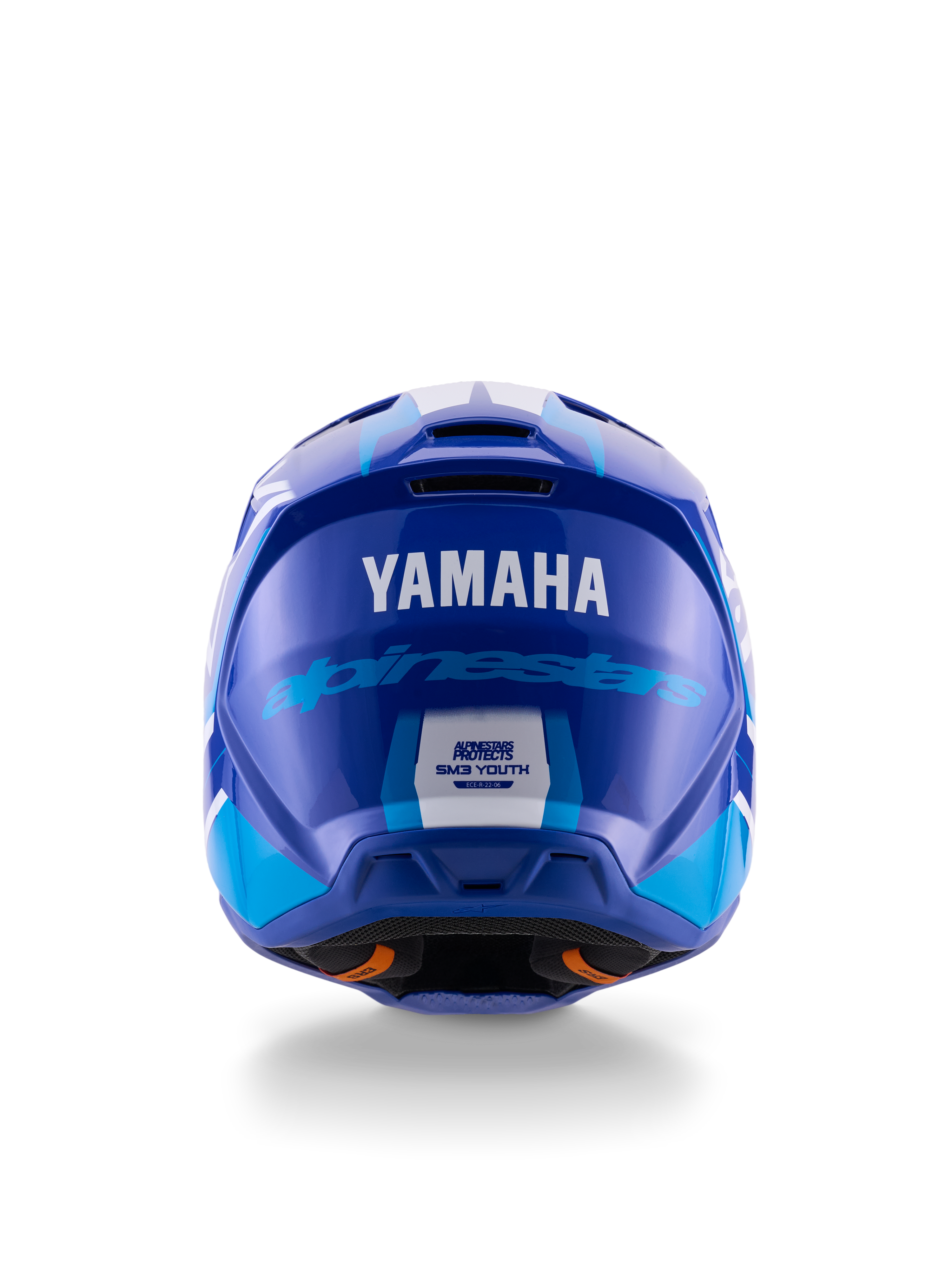Yamaha S-M3 Youth Motocross Helmet, Rear view, Blue and White Glossy, featuring prominent Yamaha and Alpinestars branding, aerodynamic shell design with ECE 22.06 safety certification label, professional head protection for off-road racing