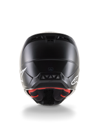 Rear view of the Alpinestars S-M5 Solid Helmet ECE 22.06, Motocross Helmet, Black Matte finish, featuring white Alpinestars logos on the sides, red inner lining, and aerodynamic shell with exhaust vents.