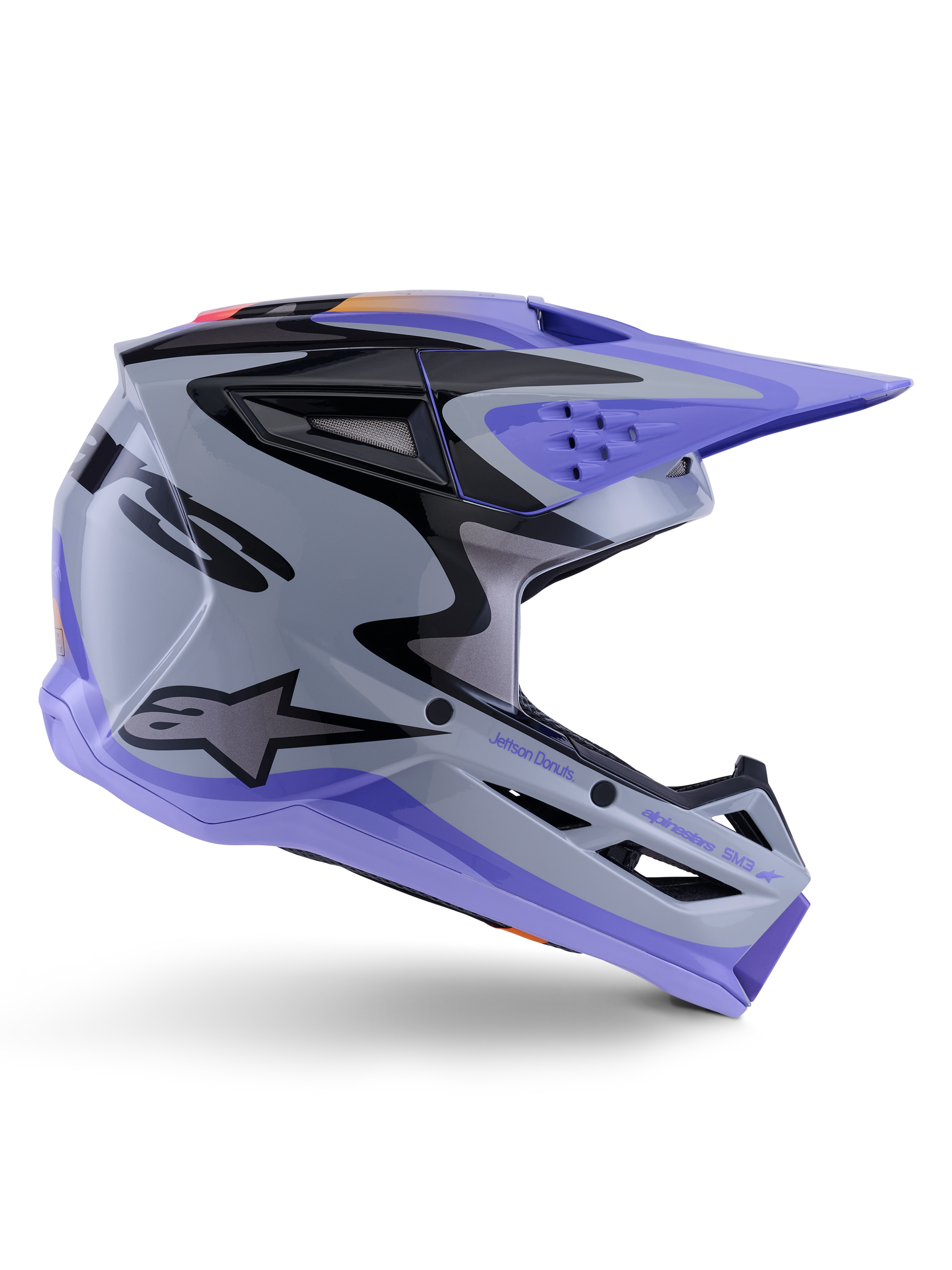 Alpinestars S-M3 Jettson Helmet ECE 22.06, Motocross Helmet, Gray Purple and Black Glossy, side profile view featuring a purple visor and chin guard, sleek aerodynamic shell with black graphics, multiple ventilation ports, and "Jettson Donuts" branding on the side.
