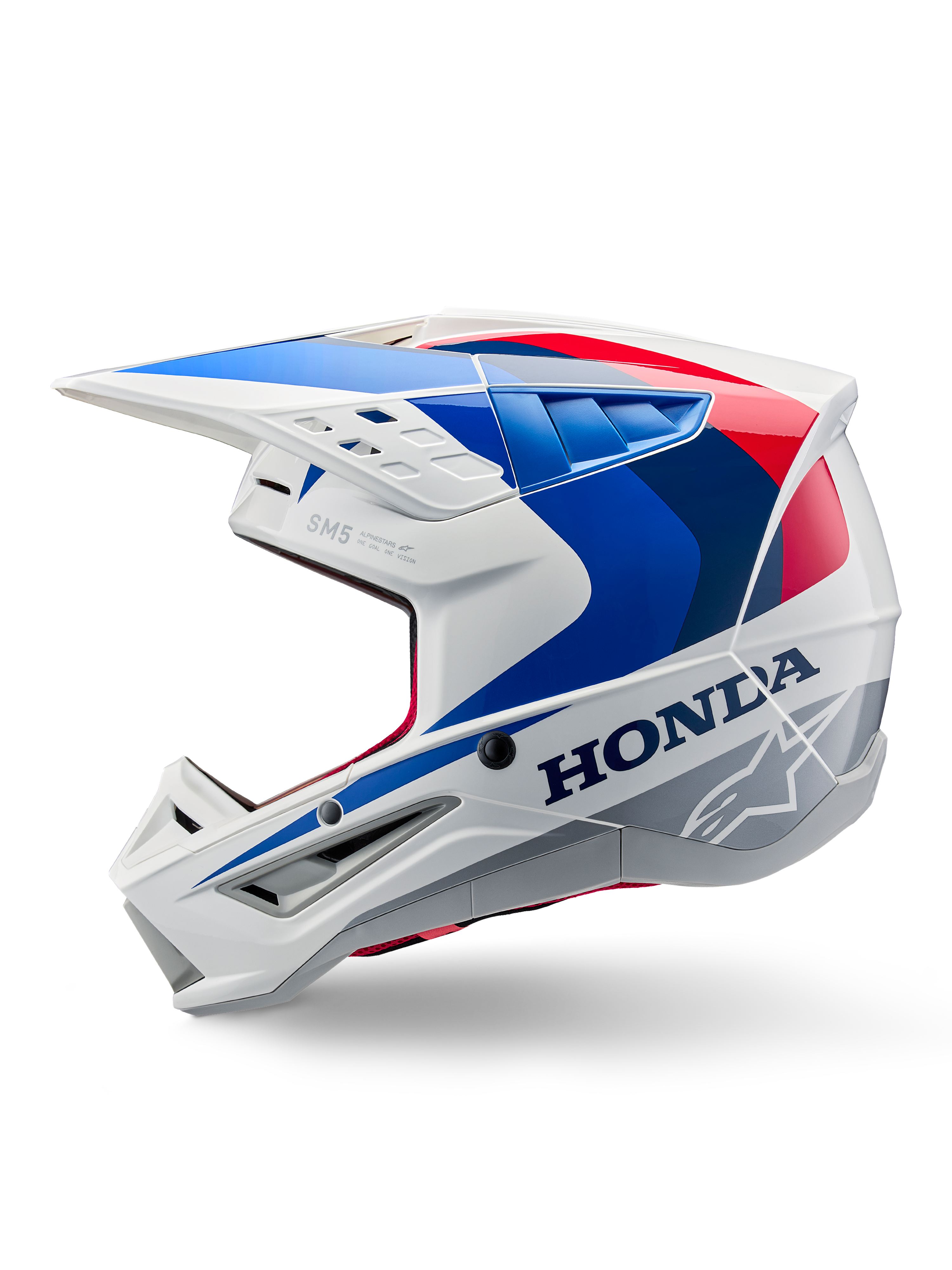 Alpinestars Honda S-M5 Helmet ECE, White Blue Red Glossy, side profile view, featuring bold Honda branding and Alpinestars star logo, aerodynamic motocross design with multiple air vents and a prominent peak visor, glossy finish