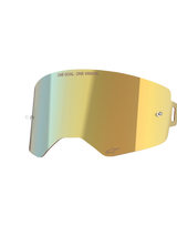 Alpinestars Supertech Mirror Lens, Mirror Gold, reflective replacement goggle lens with integrated tear-off posts and 'ONE GOAL. ONE VISION.' text, high-clarity motocross accessory.
