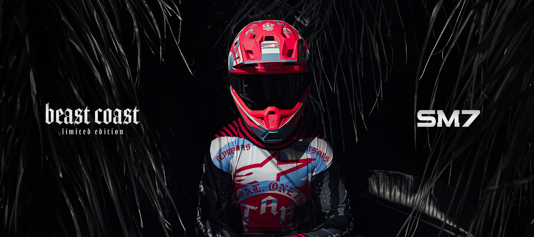 Alpinestars Limited Edition S-M7 Beast Coast Helmet, Motocross gear in Light Gray and Hot Orange, dark tropical background.