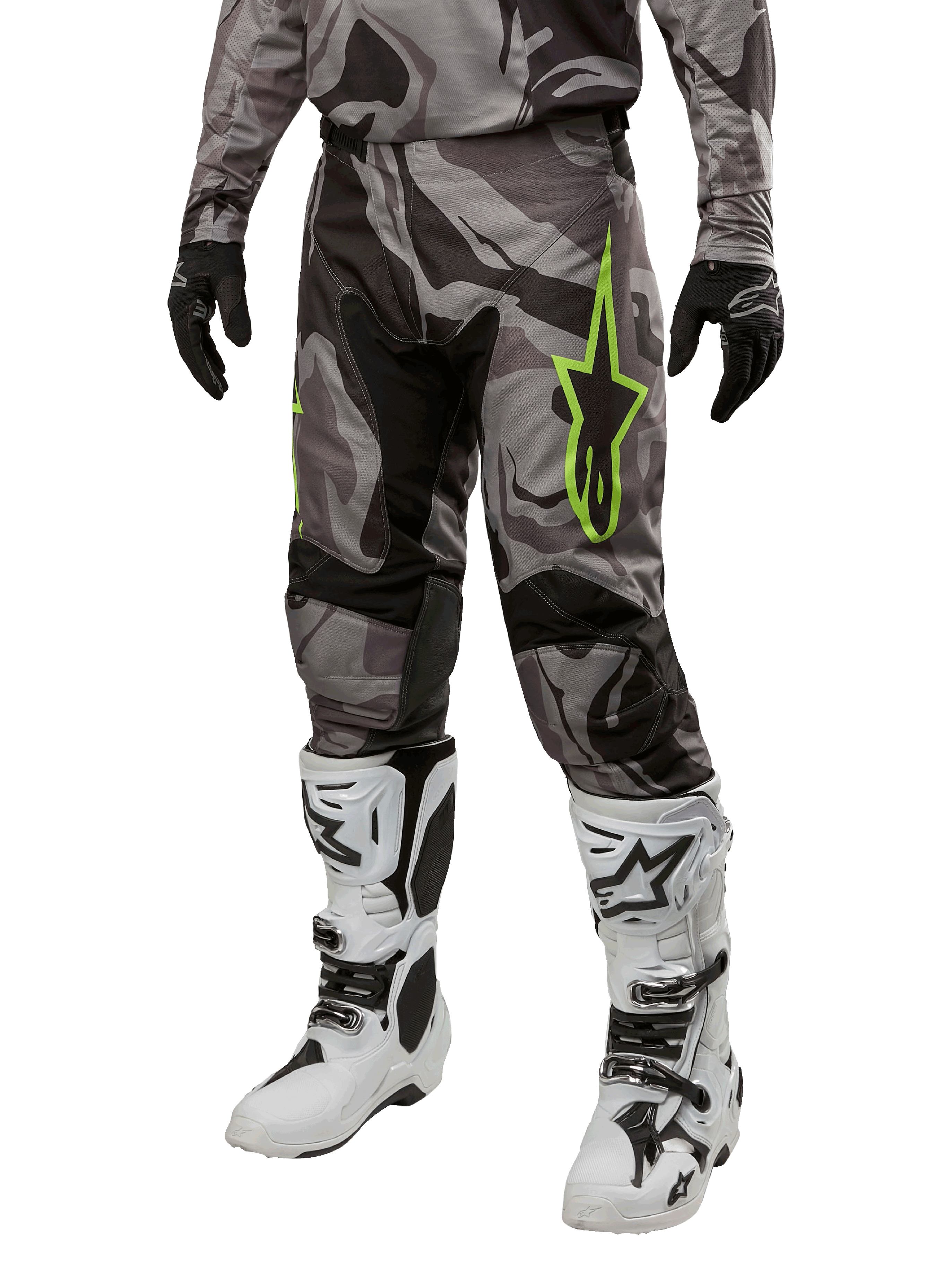 Alpinestars 2024 Racer Tactical Pants, Motocross Pants, Gray and Black Camouflage, lime green star logo, worn with white and black boots and black gloves, off-road riding gear