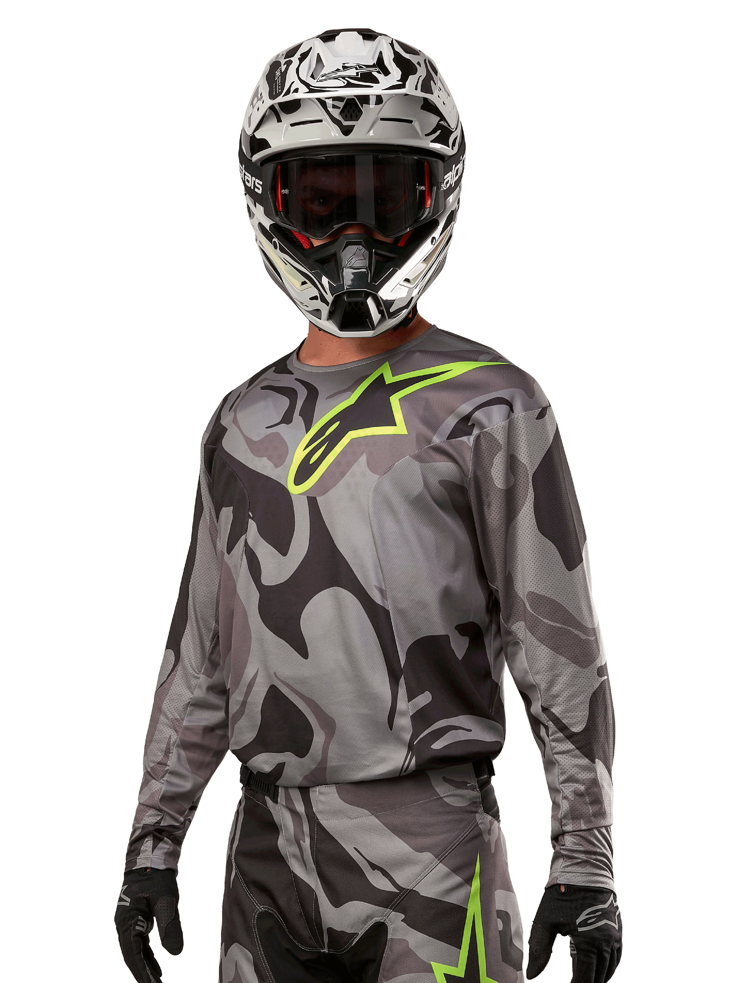 Alpinestars 2024 Racer Tactical Jersey, Motocross Jersey, Cast Gray Camo Magnet with neon green logo, worn with black and white helmet and black gloves, technical moisture-wicking fabric for off-road racing