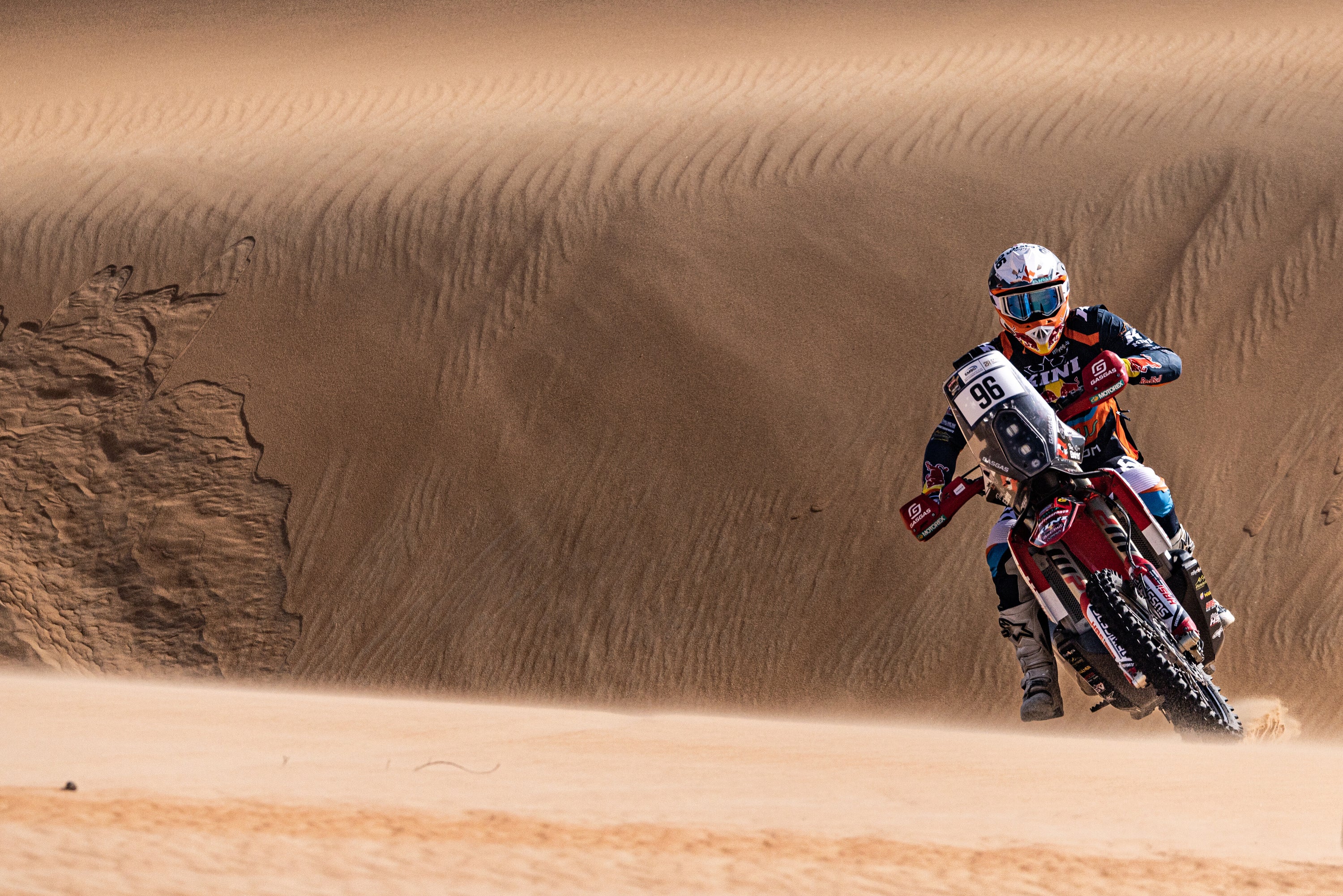 Sebastian Buhler rallying in the desert dunes on his GasGas enduro bike