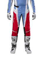 Alpinestars 2024 Techstar Ocuri Pants, Motocross Pants, Light Blue, Mars Red and White, front view from the waist down, paired with white and black motocross boots and gloves, technical gear designed for high-performance off-road racing.