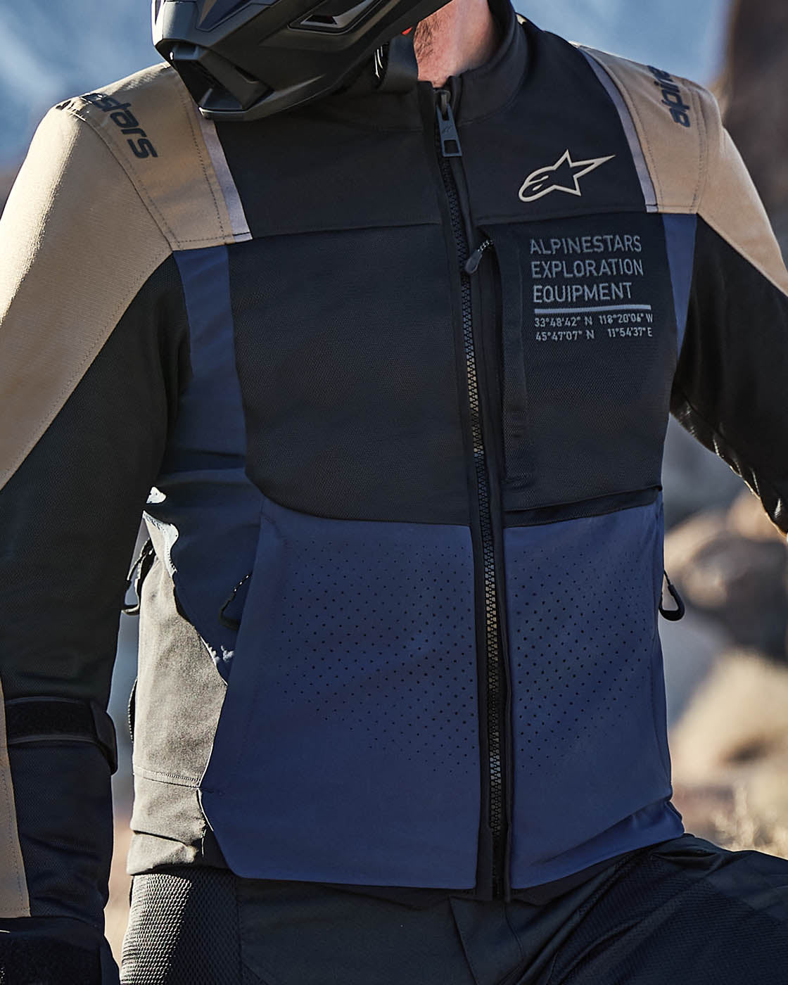 Alpinestars ST-2 Air Jacket, men's adventure touring jacket in black and navy blue with ventilated mesh panels.