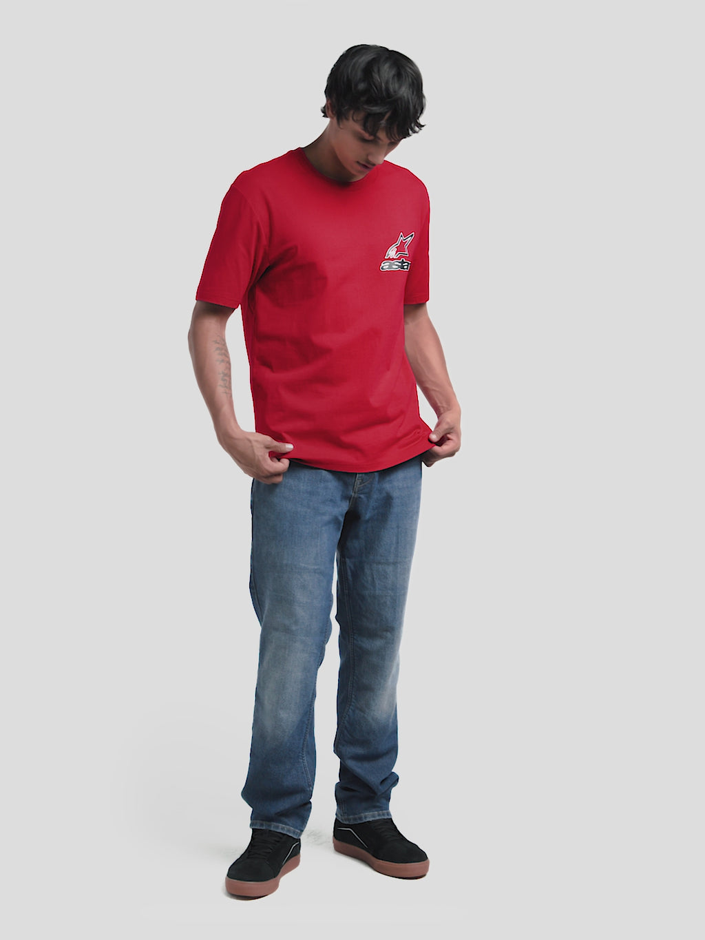 Alpinestars Lineout CSF Tee, Red Short Sleeve Sportswear T-Shirt, featuring front and back Astars logo graphics in white and black. This casual men's top is made from a soft cotton-poly blend, showcasing a clean branded look with the 'One Goal. One Vision.' motto on the back. Ideal for motorsports enthusiasts and everyday lifestyle wear.